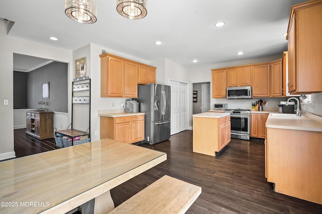201 Manfre Ct, Freehold, NJ 07728 - kitchen featuring stainless steel appliances, a sink, light countertops, a kitchen island, and dark wood finished floors