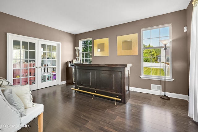 201 Manfre Ct, Freehold, NJ 07728 - living room with french doors, baseboards, and dark wood-type flooring