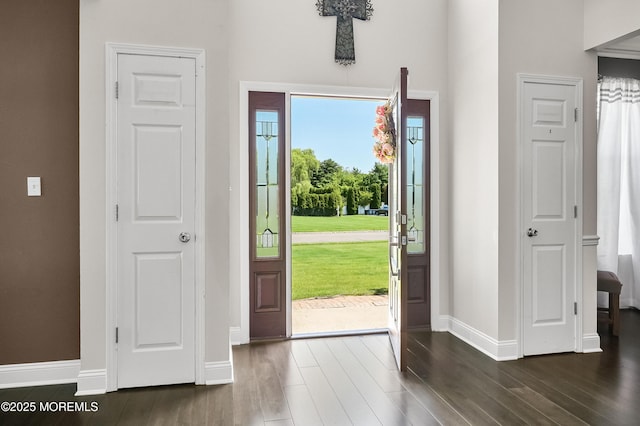 201 Manfre Ct, Freehold, NJ 07728 - foyer entrance with dark wood-style floors, baseboards, and a towering ceiling