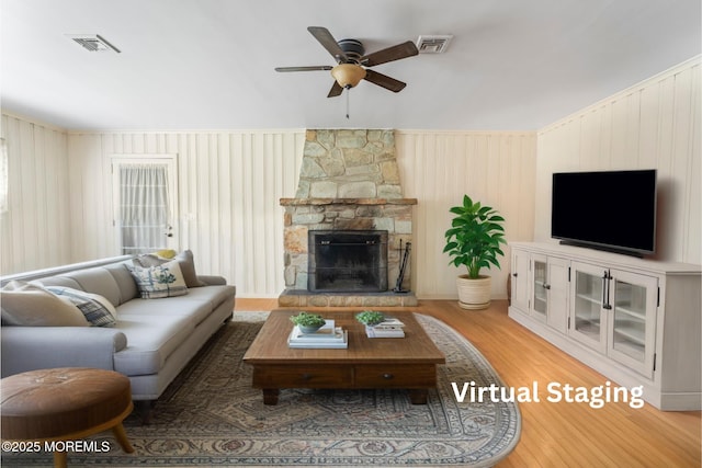 96 Gordons Corner Rd, Manalapan, NJ 07726 - living room with a ceiling fan, wood finished floors, and a fireplace