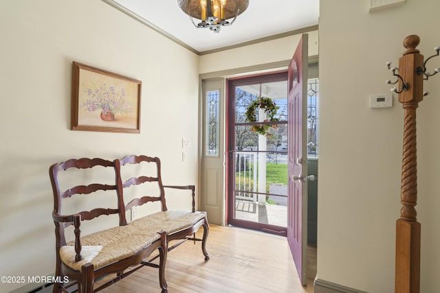 96 Gordons Corner Rd, Manalapan, NJ 07726 - entryway with light wood-style floors and ornamental molding
