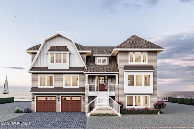 275 Curtis Point Dr, Mantoloking, NJ 08738 - shingle-style home featuring stairway, a water view, a garage, a standing seam roof, and decorative driveway