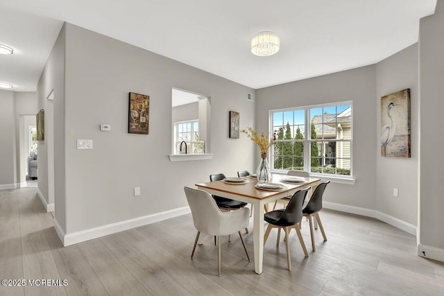 6 Isabella Dr, Manchester, NJ 08759 - dining room featuring light wood finished floors and baseboards