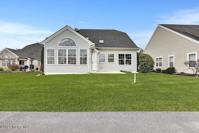 6 Isabella Dr, Manchester, NJ 08759 - rear view of property with a yard and a patio
