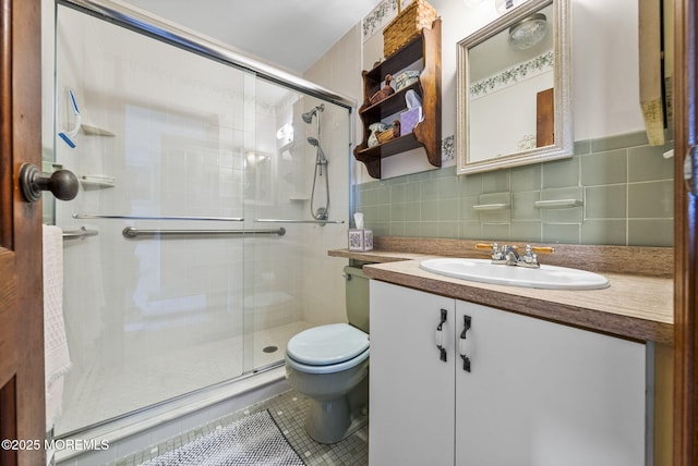 100 Seaview Ave Unit 4-12, Monmouth Beach, NJ 07750 - bathroom featuring toilet, vanity, a shower stall, tile patterned flooring, and decorative backsplash