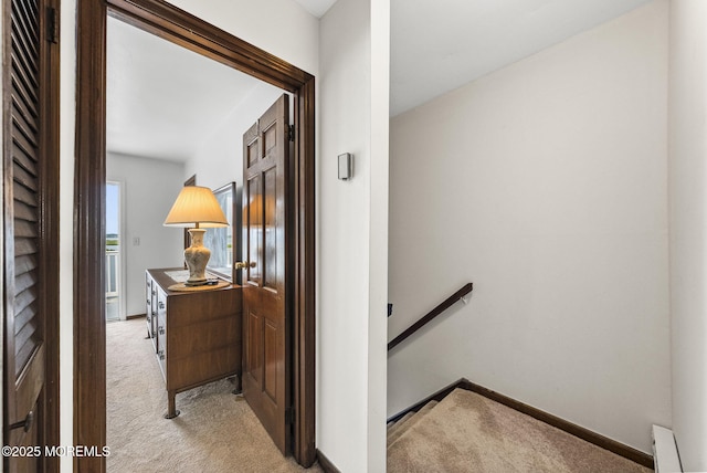 100 Seaview Ave Unit 4-12, Monmouth Beach, NJ 07750 - hallway featuring an upstairs landing, light carpet, and baseboards