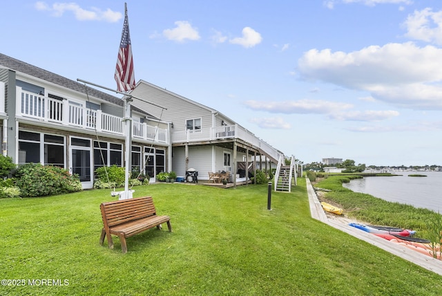 100 Seaview Ave Unit 4-12, Monmouth Beach, NJ 07750 - back of property with a water view and a lawn