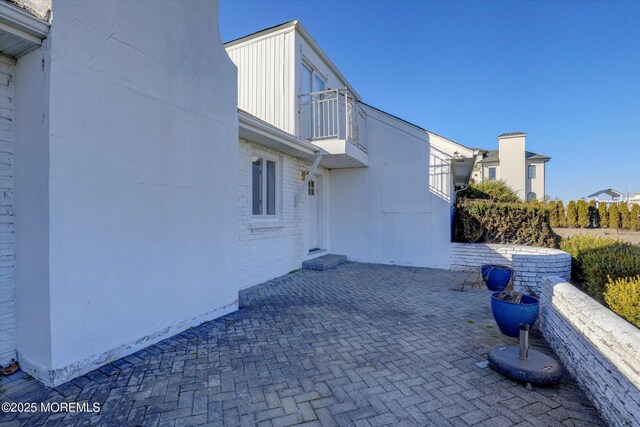 58 Ocean Ave, Deal, NJ 07723 - view of patio with a balcony