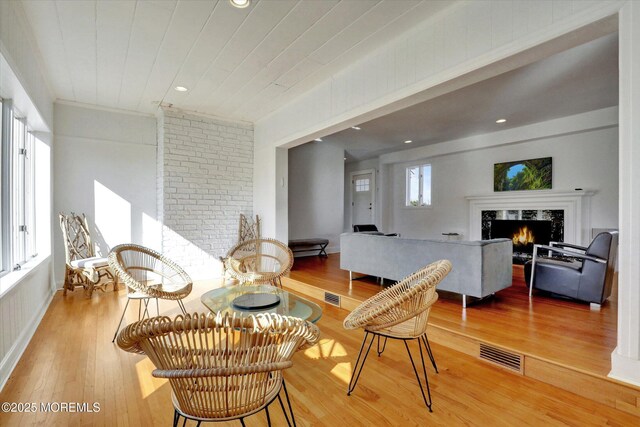 58 Ocean Ave, Deal, NJ 07723 - living area with a premium fireplace, wood finished floors, and recessed lighting