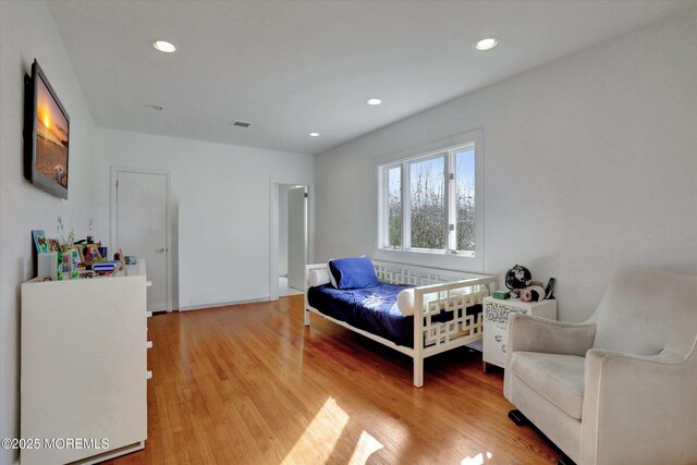 58 Ocean Ave, Deal, NJ 07723 - bedroom with light wood-type flooring and recessed lighting
