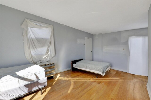 58 Ocean Ave, Deal, NJ 07723 - bedroom with light wood finished floors