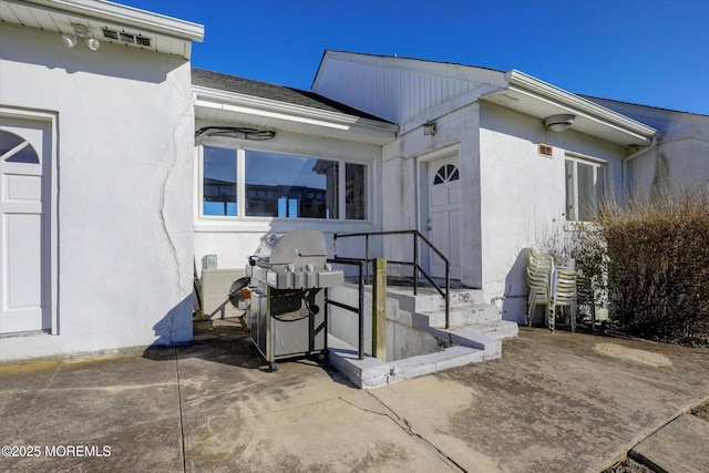58 Ocean Ave, Deal, NJ 07723 - doorway to property with stucco siding