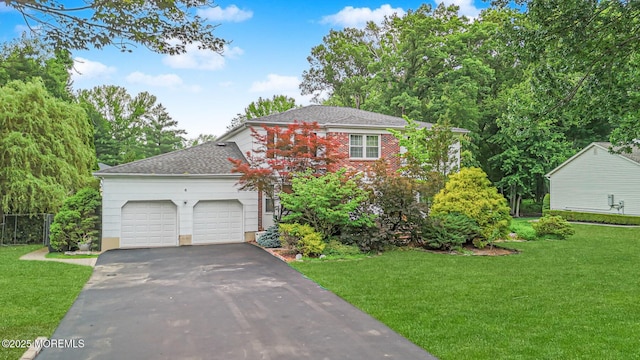 6 Quid Pl, Manalapan, NJ 07726 - view of front of house with driveway, an attached garage, a front yard, and a shingled roof