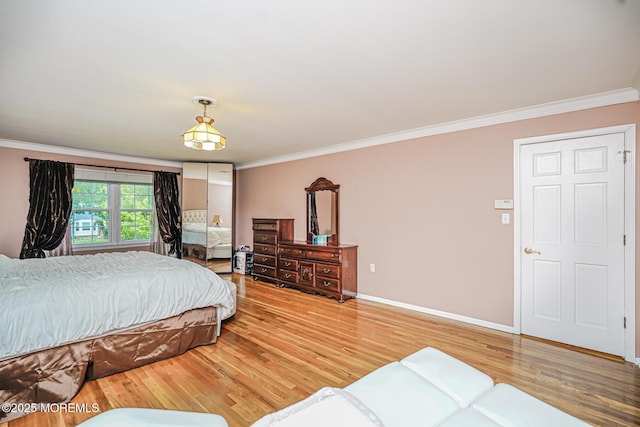 6 Quid Pl, Manalapan, NJ 07726 - bedroom featuring crown molding, light wood-type flooring, and baseboards