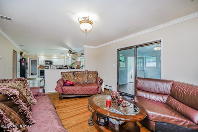 6 Quid Pl, Manalapan, NJ 07726 - living room featuring ornamental molding, light wood-type flooring, baseboard heating, a ceiling fan, and recessed lighting