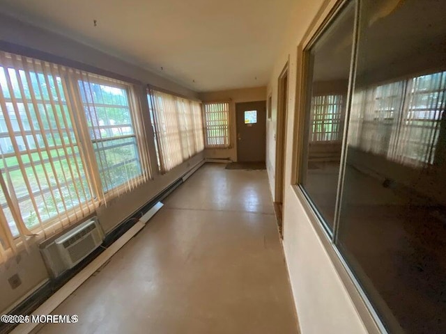 10 Hemlock St Unit D, Toms River, NJ 08757 - unfurnished sunroom featuring a wall unit AC