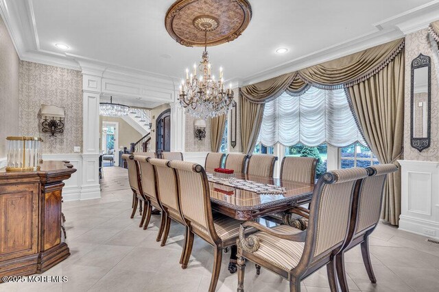 23 Pilgrim Way, Colts Neck, NJ 07722 - dining area with ornamental molding, a chandelier, wainscoting, a decorative wall, and healthy amount of natural light