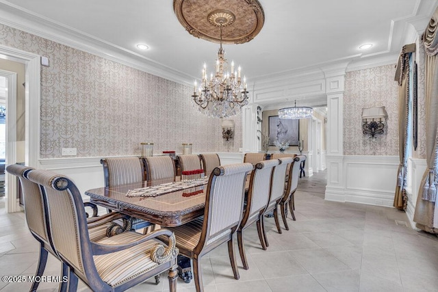 23 Pilgrim Way, Colts Neck, NJ 07722 - dining room featuring a chandelier, ornamental molding, wallpapered walls, wainscoting, and light tile patterned floors