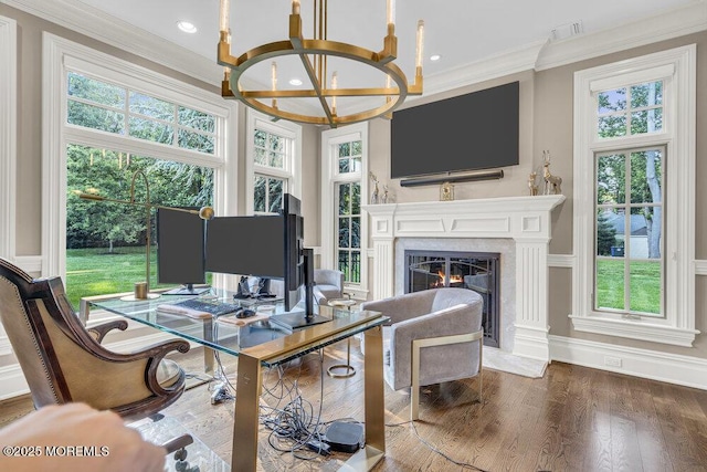 23 Pilgrim Way, Colts Neck, NJ 07722 - office area featuring a chandelier, healthy amount of natural light, a fireplace, crown molding, and wood finished floors