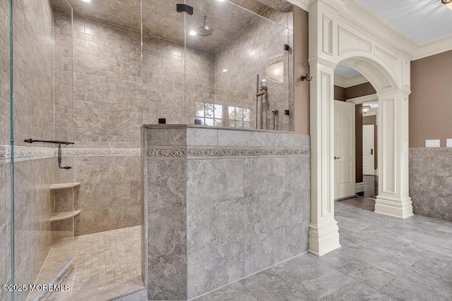 23 Pilgrim Way, Colts Neck, NJ 07722 - full bathroom with decorative columns, tile walls, a walk in shower, and ornamental molding
