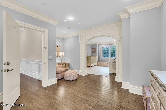 23 Pilgrim Way, Colts Neck, NJ 07722 - hall featuring ornate columns, ornamental molding, wood finished floors, recessed lighting, and arched walkways