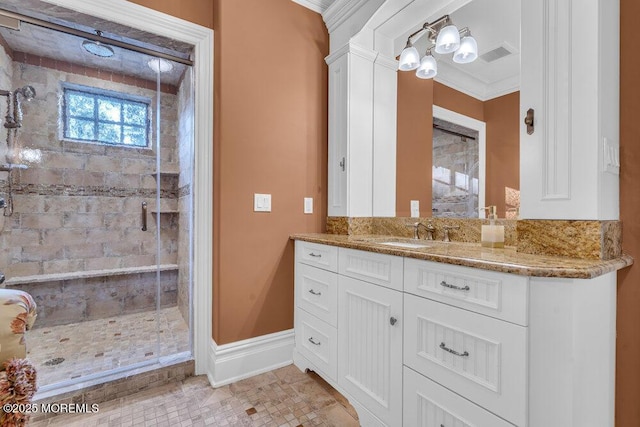 23 Pilgrim Way, Colts Neck, NJ 07722 - bathroom featuring vanity, a shower stall, ornamental molding, baseboards, and tile patterned flooring