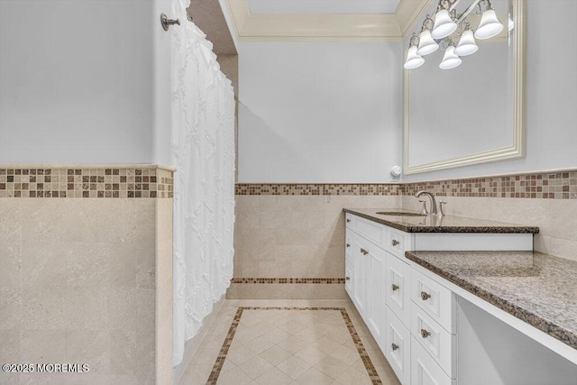23 Pilgrim Way, Colts Neck, NJ 07722 - bathroom with tile walls, vanity, wainscoting, crown molding, and inlaid floor details