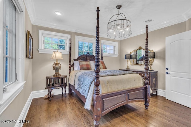 23 Pilgrim Way, Colts Neck, NJ 07722 - bedroom with a chandelier, wood finished floors, baseboards, ornamental molding, and recessed lighting
