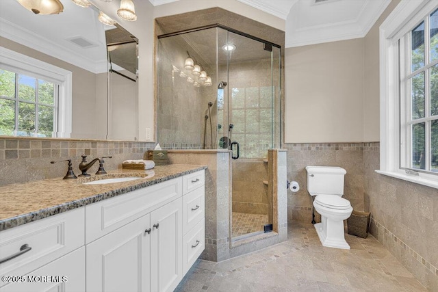 23 Pilgrim Way, Colts Neck, NJ 07722 - full bath featuring ornamental molding, vanity, healthy amount of natural light, a shower stall, and tile walls