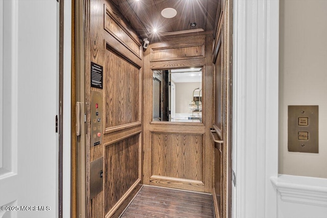 23 Pilgrim Way, Colts Neck, NJ 07722 - elevator featuring wooden walls and wood finished floors