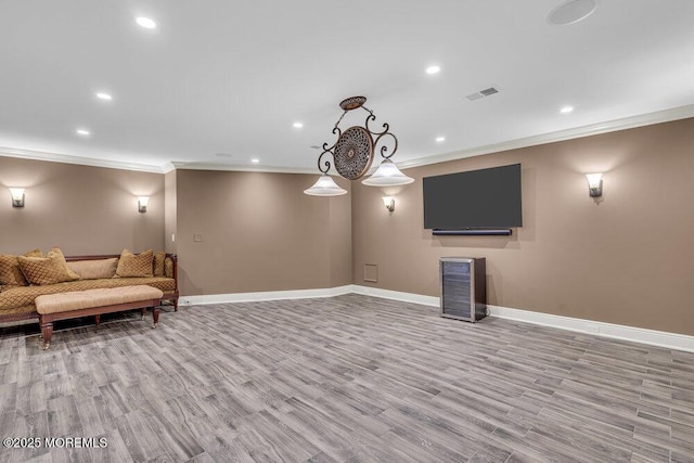 23 Pilgrim Way, Colts Neck, NJ 07722 - sitting room with ornamental molding, baseboards, wood finished floors, and recessed lighting
