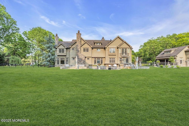 23 Pilgrim Way, Colts Neck, NJ 07722 - back of house with a lawn and a chimney