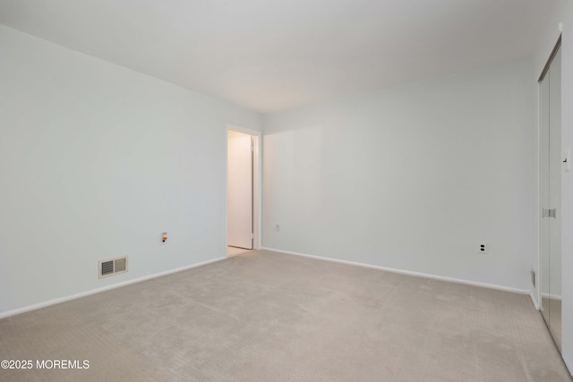 40 Smoke Tree Ter Unit 142, Red Bank, NJ 07701 - empty room featuring light carpet and baseboards