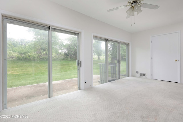 40 Smoke Tree Ter Unit 142, Red Bank, NJ 07701 - unfurnished sunroom featuring a ceiling fan