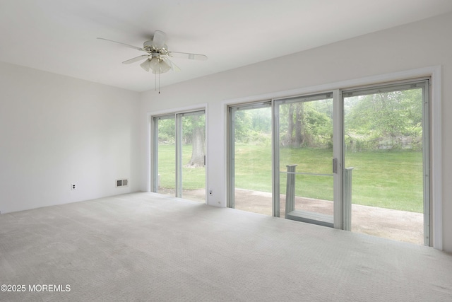 40 Smoke Tree Ter Unit 142, Red Bank, NJ 07701 - carpeted spare room with healthy amount of natural light and ceiling fan