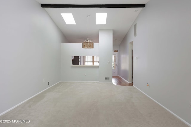 40 Smoke Tree Ter Unit 142, Red Bank, NJ 07701 - spare room with a chandelier, light carpet, and vaulted ceiling