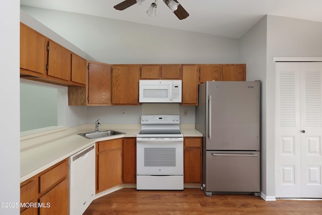 40 Smoke Tree Ter Unit 142, Red Bank, NJ 07701 - kitchen featuring white appliances, ceiling fan, light countertops, wood finished floors, and lofted ceiling