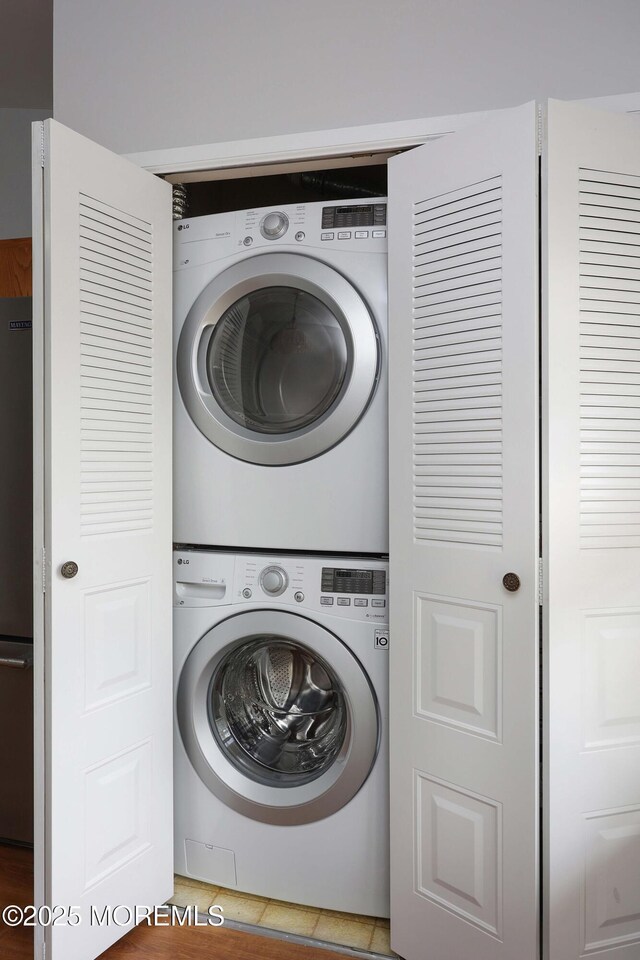 40 Smoke Tree Ter Unit 142, Red Bank, NJ 07701 - washroom featuring estacked washer and dryer