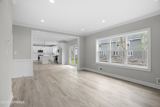 801 Commonwealth Blvd, Toms River, NJ 08757 - unfurnished living room with ornamental molding, light wood-type flooring, and recessed lighting