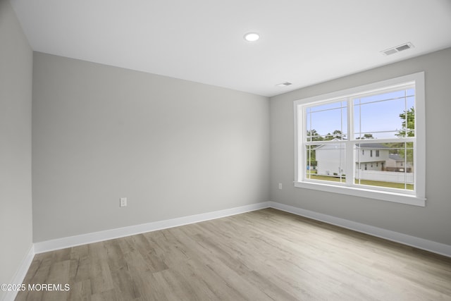 801 Commonwealth Blvd, Toms River, NJ 08757 - unfurnished room with light wood-style flooring and recessed lighting