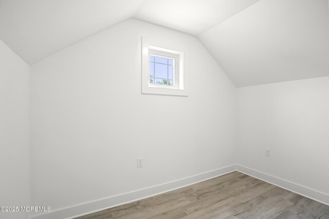 801 Commonwealth Blvd, Toms River, NJ 08757 - additional living space with wood finished floors and vaulted ceiling