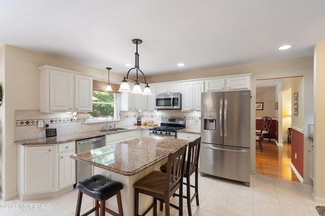 1102 Schencks Mill Line Rd, Toms River, NJ 08753 - kitchen featuring appliances with stainless steel finishes, a sink, white cabinets, and recessed lighting