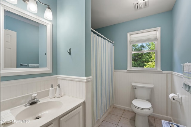1102 Schencks Mill Line Rd, Toms River, NJ 08753 - bathroom with a wainscoted wall, toilet, vanity, tile patterned floors, and a shower with curtain