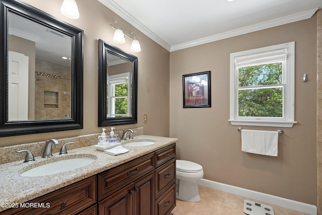 1102 Schencks Mill Line Rd, Toms River, NJ 08753 - bathroom featuring double vanity, toilet, tile patterned flooring, ornamental molding, and baseboards