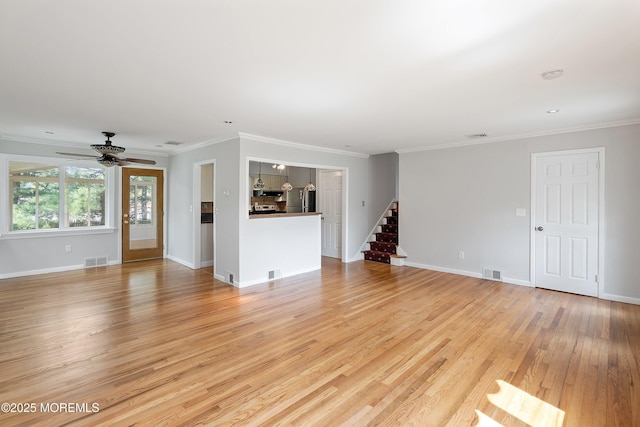 2005 Nassau Dr, Spring Lake, NJ 07762 - unfurnished living room featuring stairs, light wood-style floors, crown molding, and ceiling fan
