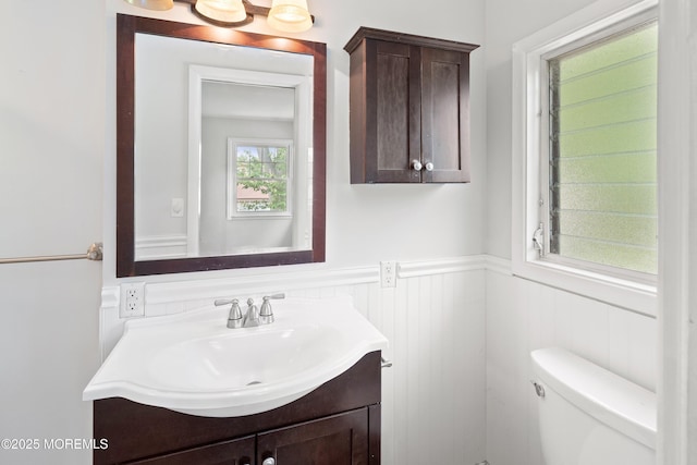 2005 Nassau Dr, Spring Lake, NJ 07762 - half bathroom with vanity and a wainscoted wall