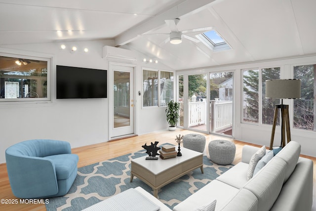 2005 Nassau Dr, Spring Lake, NJ 07762 - living area featuring a ceiling fan, wood finished floors, and a skylight
