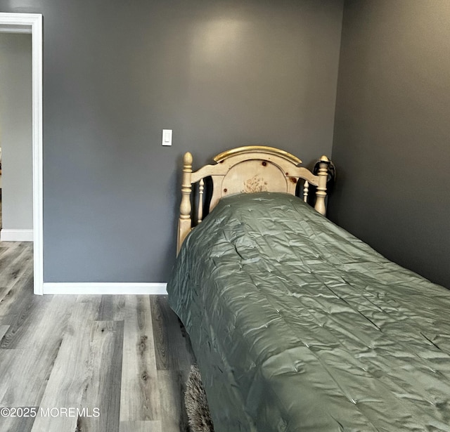 470 Mantoloking Rd, Brick, NJ 08723 - bedroom featuring wood finished floors and baseboards