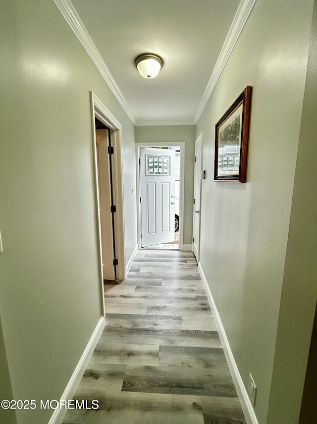 470 Mantoloking Rd, Brick, NJ 08723 - hall with crown molding, light wood-style floors, and baseboards