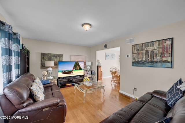 40 Wood St, Keansburg, NJ 07734 - living room featuring wood finished floors and baseboards